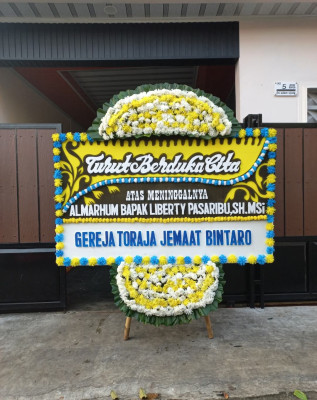 Papan Bunga Duka di Gika